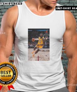 LeBron James in a tank top, showcasing his Los Angeles Lakers No. 23 jersey, striking a superstar pose on the court.