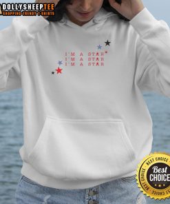 Hot Marina wearing a stylish I'm a Star hoodie, showcasing her trendy fashion sense and vibrant personality.