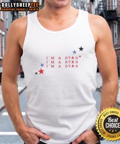 Hot marina wearing 'I'm A Star' tank top, showcasing a vibrant summer style by the beach.