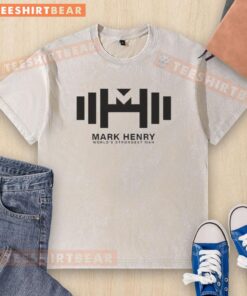 Hot Mark Henry, World's Strongest Man, showcasing his strength in a washed T-shirt during a strongman competition.