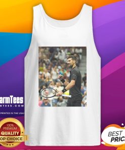 Alt Text: Novak Djokovic wearing a stylish tank top during the 2025 US Open tennis tournament, showcasing his athletic style.