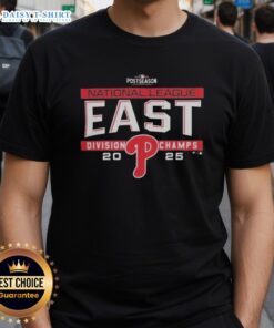 Alt Text: Hot Philadelphia Phillies MLB 2025 NL East Division Title locker room team T-shirt celebrating postseason victory.