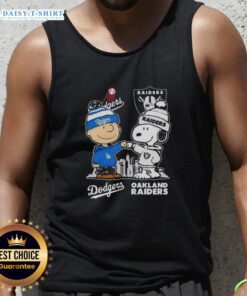 Hot Snoopy and Charlie Brown tank top featuring Los Angeles Dodgers and Las Vegas Raiders skyline design.