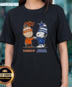 Hot Snoopy and Charlie Brown Oklahoma State Cowboys x Dallas Cowboys ladies tee featuring vibrant graphics and team logos.