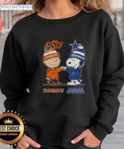 Alt Text: Hot Snoopy and Charlie Brown Oklahoma State Cowboys x Dallas Cowboys sweatshirt featuring vibrant graphics.