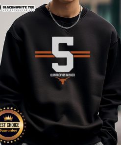 Quintrevion Wisner wearing a Hot Texas Longhorns football 5-stripe sweatshirt, showcasing team spirit and style.