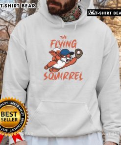 Alt Text: Jeff McNeil wearing a New York Mets hoodie featuring Hot The Flying Squirrel design at a baseball game.