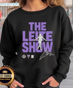 Alt Text: Carla Leite wearing a Golden State Valkyries sweatshirt on The Leite Show, showcasing stylish sports apparel.