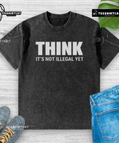 Hot 'Think It's Not Illegal Yet' washed t-shirt design showcasing a bold statement in trendy fashion for casual wear.