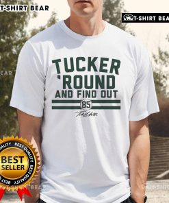Alt Text: Hot Tucker Kraft Green Bay Packers Football t-shirt featuring 'Round And Find Out' signature design