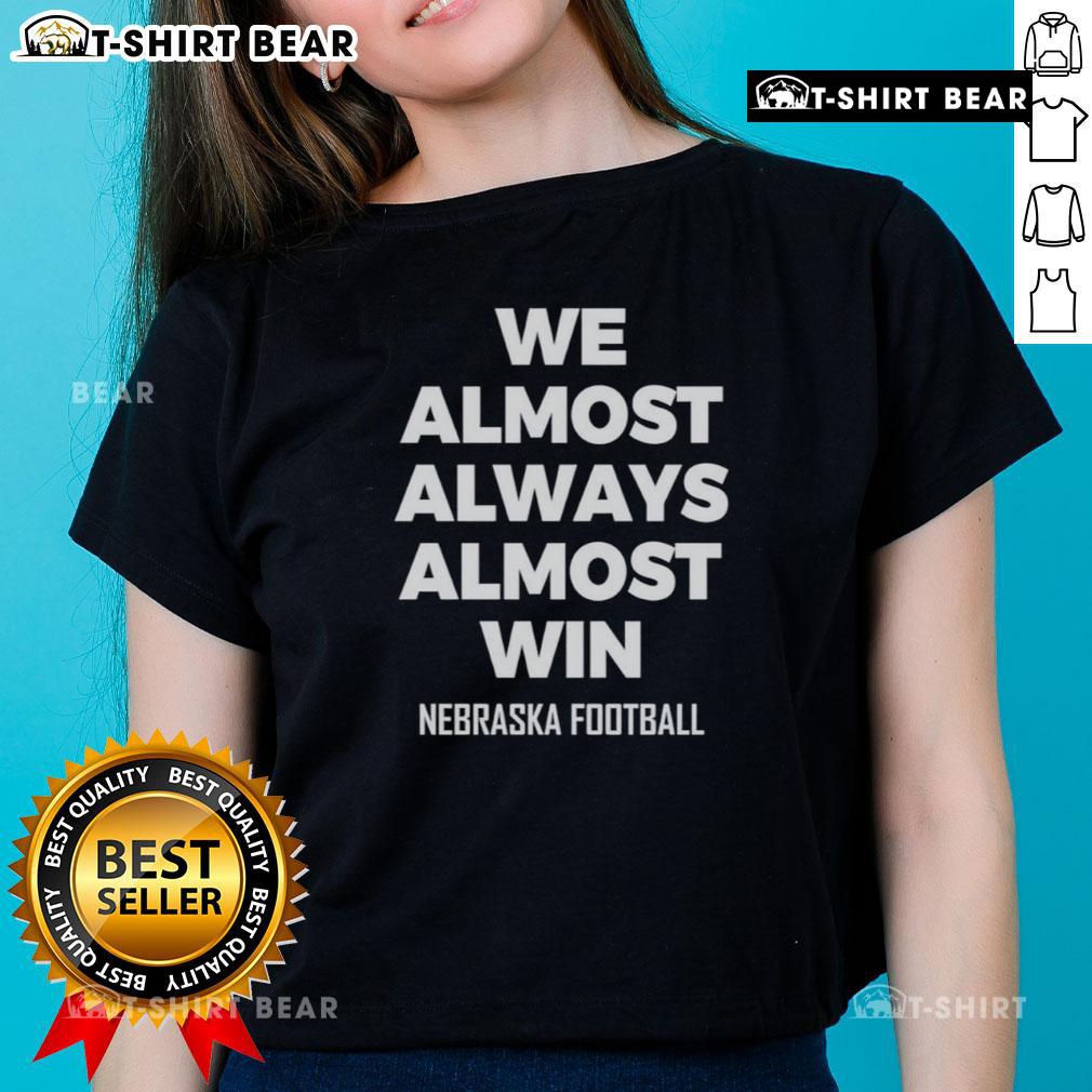Hot We Almost Always Almost Win Nebraska Football Ladies Tee Hot We Almost Always Almost Win Nebraska Football Ladies Tee showcasing team spirit and style for female fans.