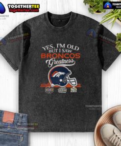 Vintage washed t-shirt featuring Denver Broncos Super Bowl helmet and skyline, perfect for fans celebrating team greatness.