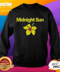 Zara Larsson wearing a trendy Midnight Sun sweatshirt, showcasing stylish design and vibrant colors in a casual setting.