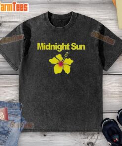 Alt Text: Zara Larsson wearing a stylish Midnight Sun washed t-shirt in a vibrant outdoor setting, showcasing summer fashion.