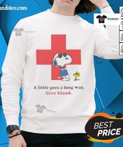 American Red Cross Peanuts Snoopy sweatshirt with 'A Little Goes A Long Way' slogan promoting blood donation.