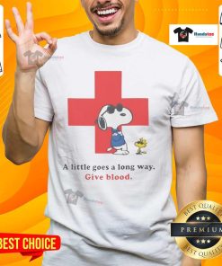 Nice American Red Cross Peanuts Snoopy T-shirt promoting blood donation with 'A Little Goes A Long Way' message.