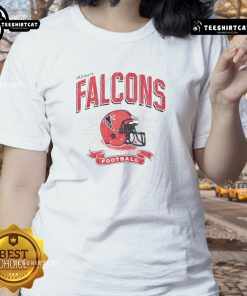 Alt Text: Vintage distressed Atlanta Falcons football helmet graphic on a stylish ladies tee, perfect for fans and casual wear.