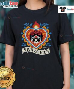 Alt Text: Frida Kahlo-inspired Calavera design on a Sagrado Corazon ladies tee, showcasing vibrant colors and artistic details.