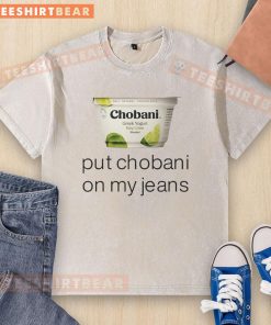 Trendy Chobani washed t-shirt featuring 'Put Chobani On My Jeans' graphic, perfect for casual wear and yogurt lovers.