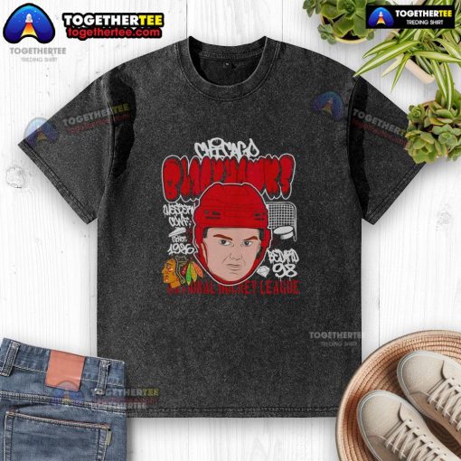 Alt Text: Cartoon of Connor Bedard with a big head on a washed t-shirt, featuring the Chicago Blackhawks logo in NHL style.
