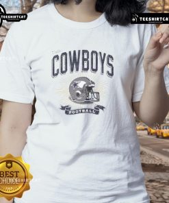 Distressed vintage ladies tee featuring a Dallas Cowboys football helmet design, perfect for fans of the team.