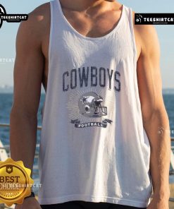 Alt Text: Distressed vintage tank top featuring the Dallas Cowboys football helmet design, perfect for fans and casual wear.
