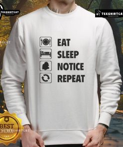 Alt Text: Cozy 'Eat Sleep Notice Repeat 2025' sweatshirt, perfect for casual wear and expressing a fun lifestyle mantra.