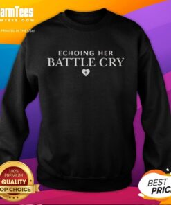 Erika Kirk wearing a stylish sweatshirt featuring 'Nice Echoing Her Battle Cry' design, showcasing a bold, empowering message.