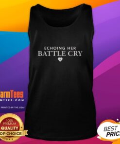 Erika Kirk wearing a stylish tank top, embodying strength and determination with a fierce battle cry expression.