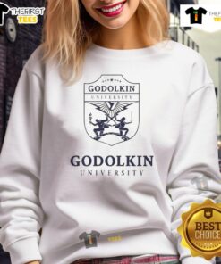 Emma Meyer wearing a Nice Gen V Godolkin University sweatshirt, showcasing stylish campus attire.