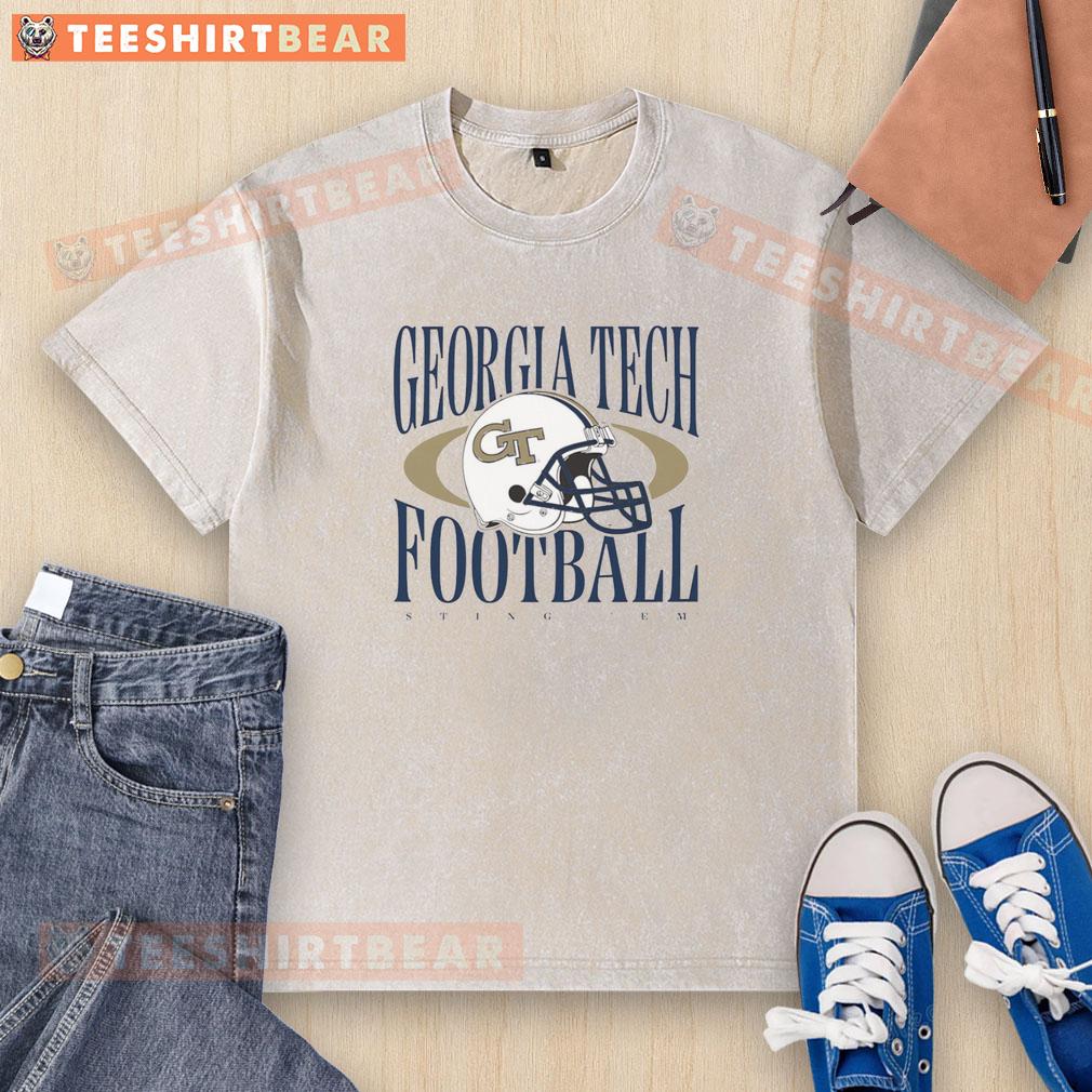 Nice Georgia Tech Yellow Jackets Football Sting 'Em Helmet Washed T Shirt Nice Georgia Tech Yellow Jackets football Sting Em helmet graphic on a washed t-shirt for fans.