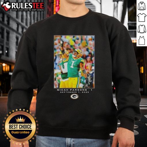 Micah Parsons wearing a Nice Green Bay sweatshirt featuring Flash design during Week 1 of the NFL season.