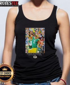 Micah Parsons showcases a Nice Green Bay tank top featuring Flash graphics during Week 1 of the NFL season.
