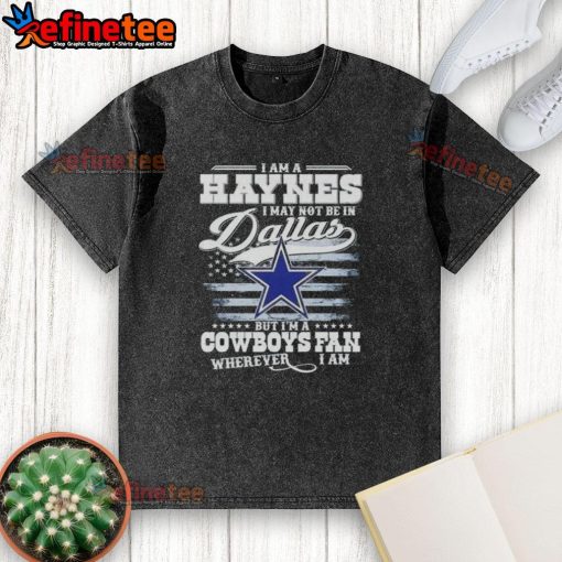 Washed t-shirt featuring 'I may not be in Dallas, but I'm a Cowboys fan wherever I am' slogan for fans.
