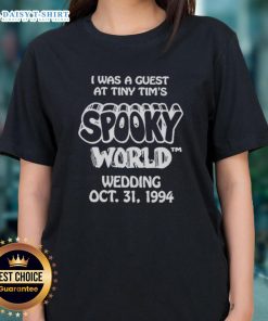 Guest at Tiny Tim's Spooky World Wedding on Oct 31, 1994, wearing a stylish ladies tee celebrating the event.