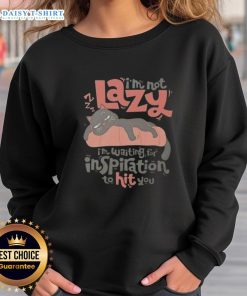 Alt Text: Cute cat in a sweatshirt with 'I'm not lazy, I'm waiting for inspiration' slogan, perfect for cat lovers.