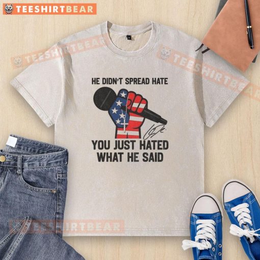 Signature washed t-shirt with 'In Memory of Charlie Kirk - He Didn't Spread Hate' design, promoting peaceful dialogue.