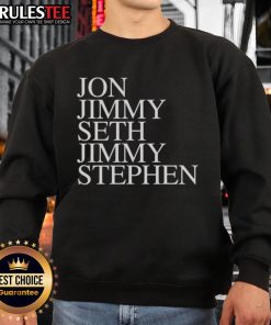 Group of friends wearing matching Nice John Jimmy Seth Jimmy Stephen sweatshirts, smiling together outdoors.