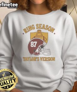 Alt Text: Stylish Kansas City Chiefs sweatshirt featuring Travis' design, perfect for fans celebrating the season.