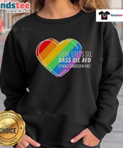 Alt Text: Pride heart sweatshirt with 'Nice Liebe Stets So' design, showcasing support against AfD sentiments.