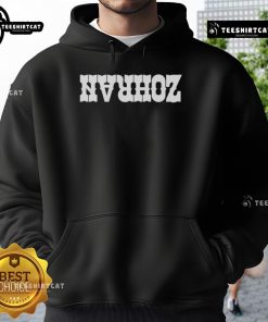 Nice Lindsey Boylan wearing a Zohran hoodie, showcasing a stylish urban outfit in a casual setting.