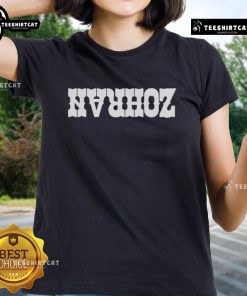 Nice Lindsey Boylan wearing Zohran Ladies Tee, showcasing stylish design and vibrant colors in a casual setting.