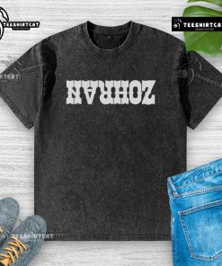 Lindsey Boylan smiling in a stylish Zohran washed t-shirt, showcasing a casual and trendy outfit.