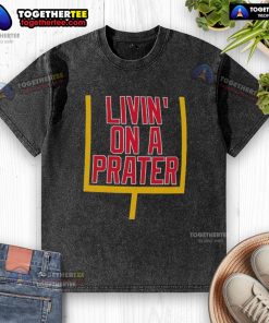 Alt Text: Nice Livin' On A Prater Buffalo Bills washed t-shirt featuring a vintage design and team logo for fans.