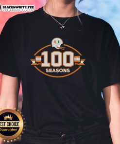 Ladies tee celebrating 100 seasons of Miami Hurricanes football, 1926-2025, featuring vibrant team colors and logo.