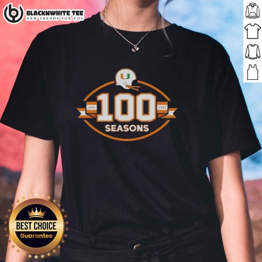 Ladies tee celebrating 100 seasons of Miami Hurricanes football, 1926-2025, featuring vibrant team colors and logo.