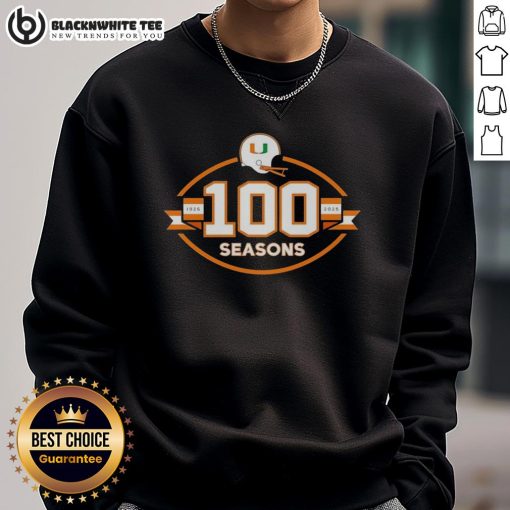 Alt Text: Cozy sweatshirt celebrating 100 seasons of Miami Hurricanes football from 1926 to 2025, perfect for fans.