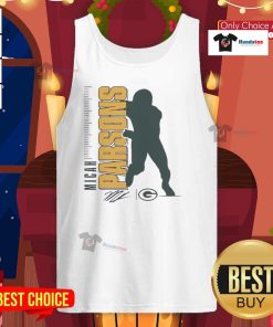 Micah Parsons wearing a Green Bay Packers tank top, showcasing style and team spirit in a vibrant outdoor setting.