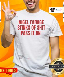 Nice Nigel Farage Stinks Of Shit Pass It On T-Shirt featuring bold text on a casual tee, perfect for humorous activism.