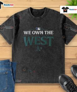 Nice Oakland Athletics 2025 We Own The American League West Division Champions washed t-shirt displayed on a hanger.